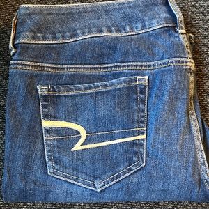 Stretch distressed AE flare jeans